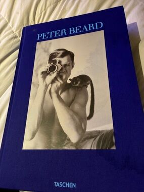 Taschen Black Hardcover Book with White Text